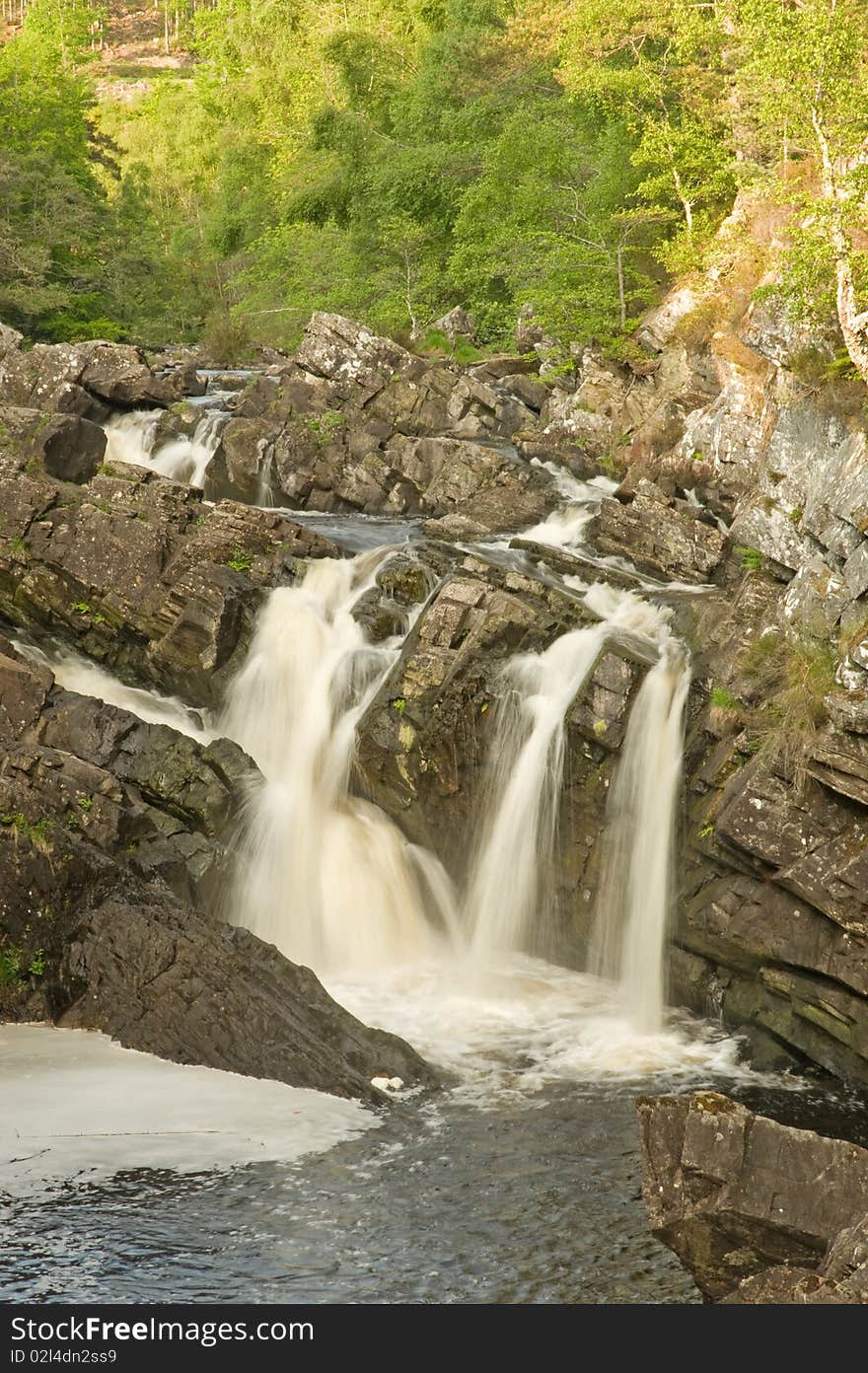 An image of the Falls of Rogie , a waterfall just off the route half way between the East and West Coasts of Scotland and fed from the River Blackwater. An image of the Falls of Rogie , a waterfall just off the route half way between the East and West Coasts of Scotland and fed from the River Blackwater.