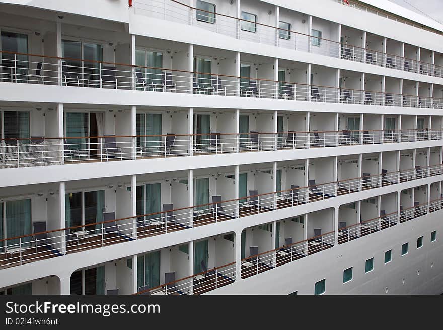 Detail of a cruise ship, view on the balconies of the outside cabines