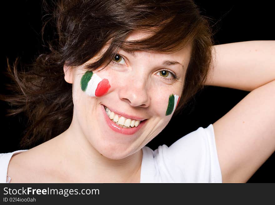 Italian team supporter with flags painted on her cheeks, studio shoot isolated on black background. Italian team supporter with flags painted on her cheeks, studio shoot isolated on black background