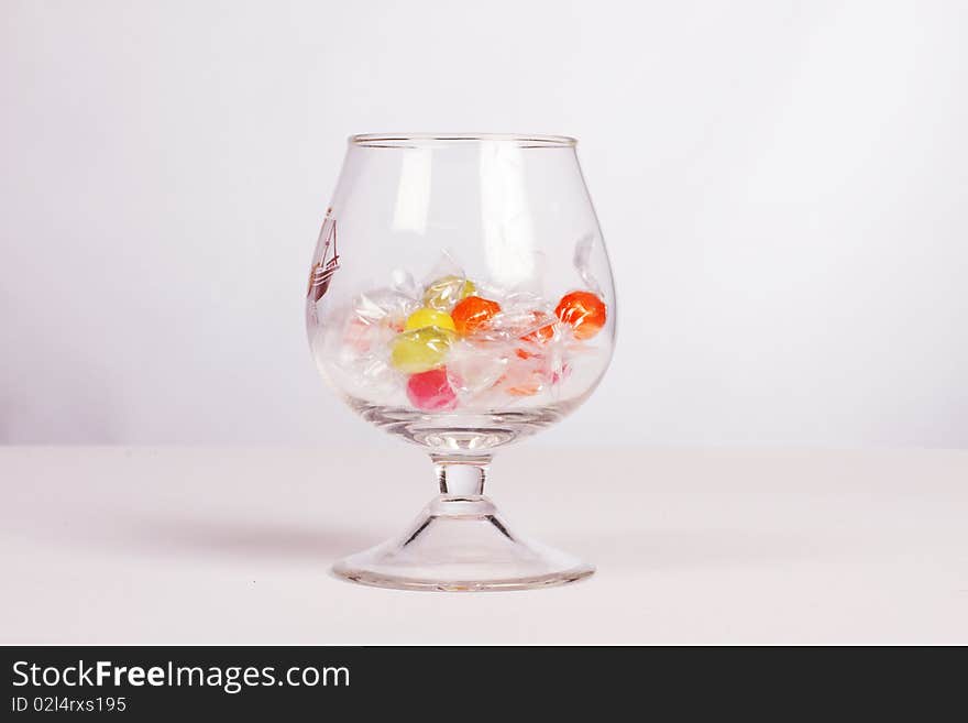 Color candies in glass on a table