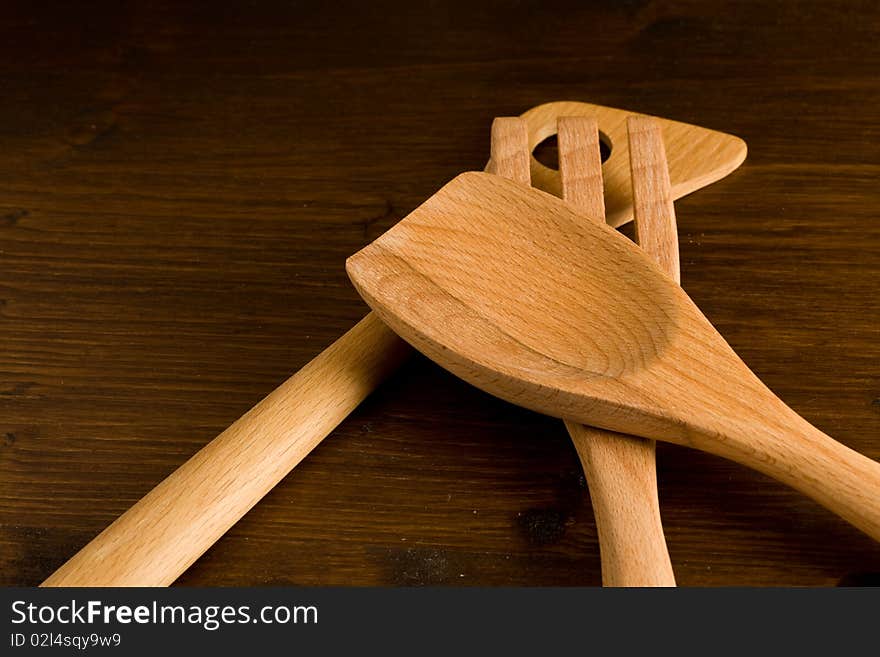 Pohoto of kitchen untensils made of wood on a wood table