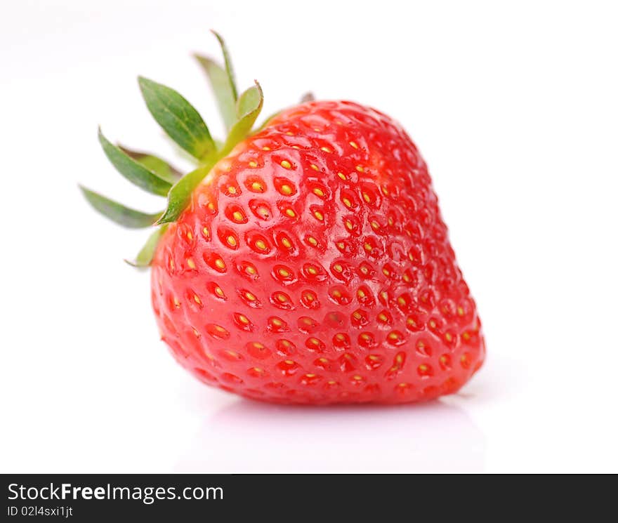 Single fresh red strawberry on white background. Single fresh red strawberry on white background
