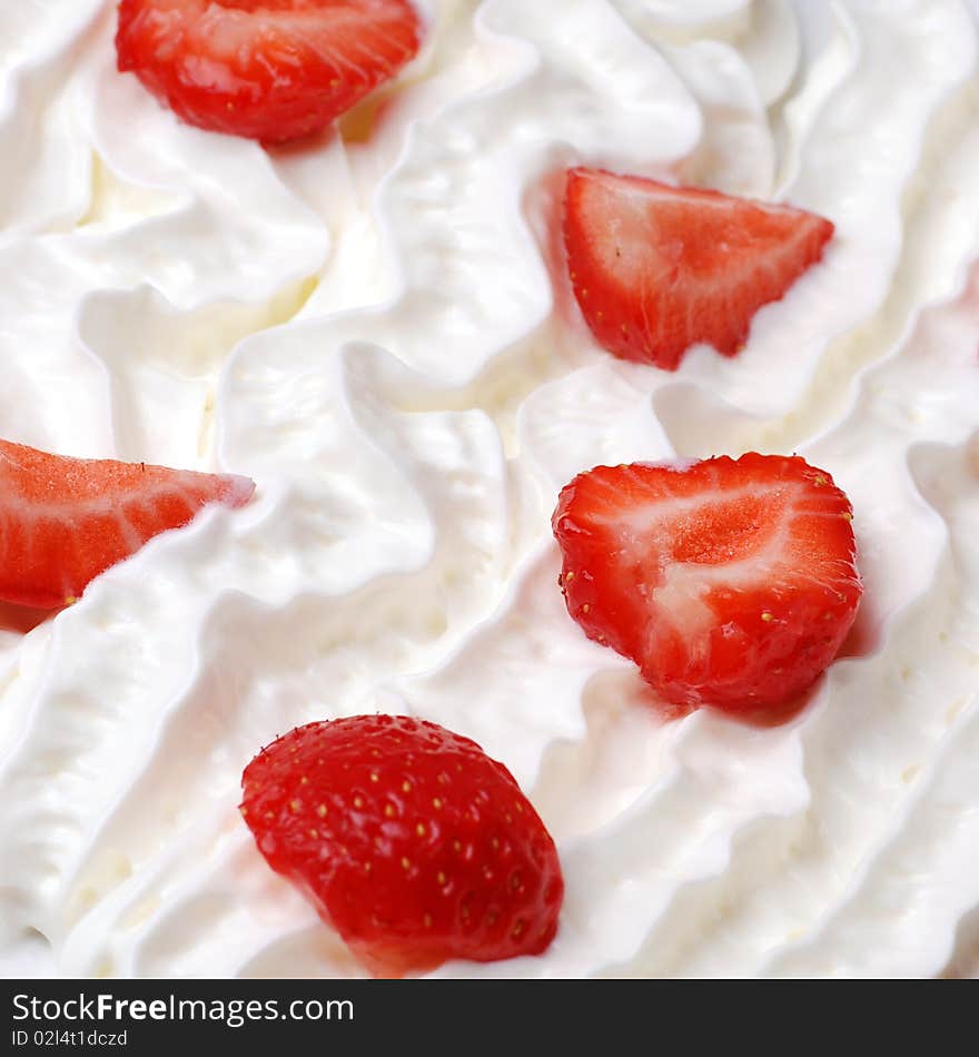 Fresh strawberries on cream high resolution image