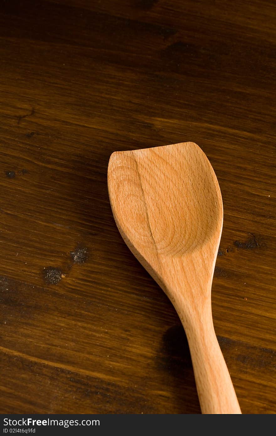 Pohoto of kitchen untensils made of wood on a wood table