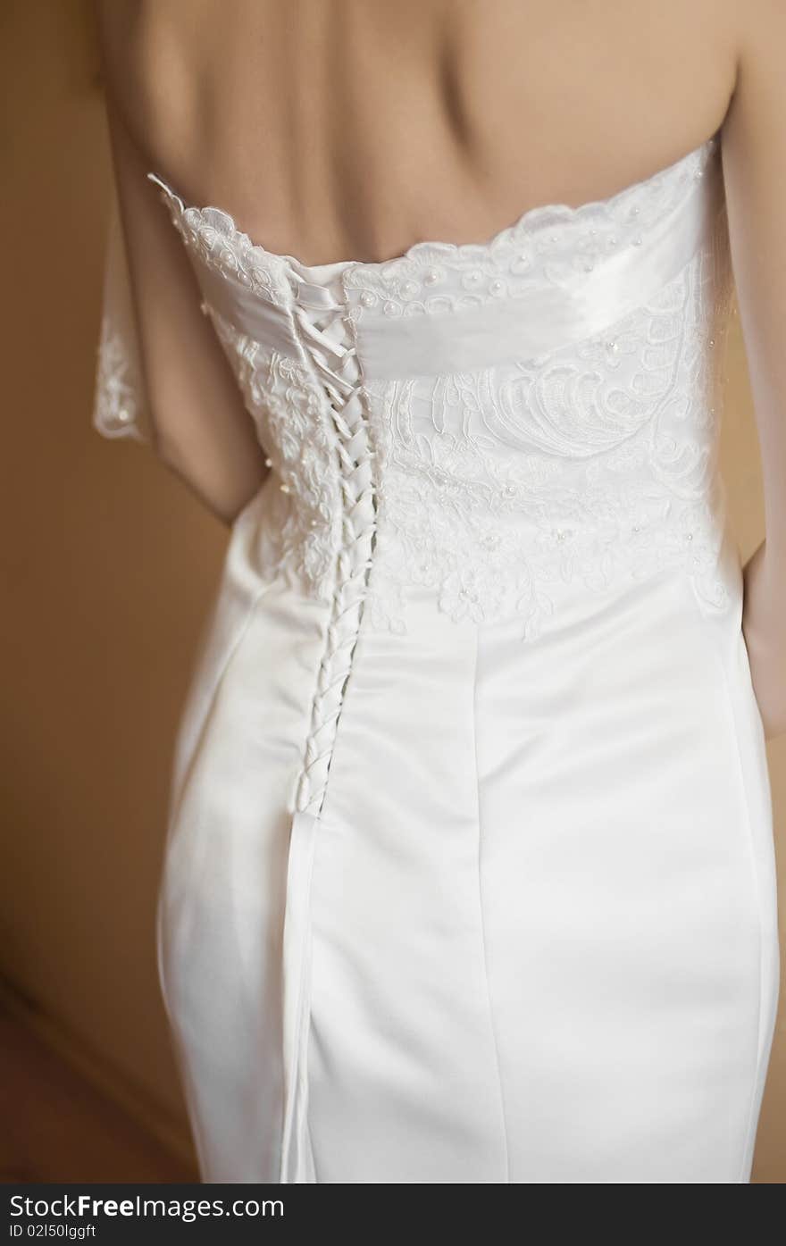 A beautiful traditional white wedding dress detail