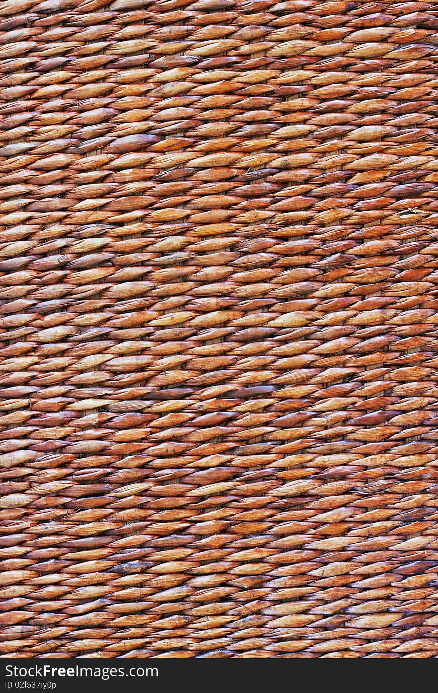 A tan cane basket texture or background