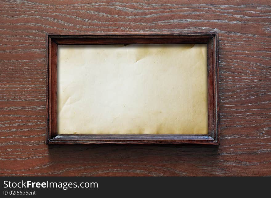 Blank photoframe on wooden wall. Blank photoframe on wooden wall