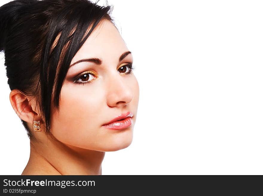 Portrait of young charming brunette woman on white background.