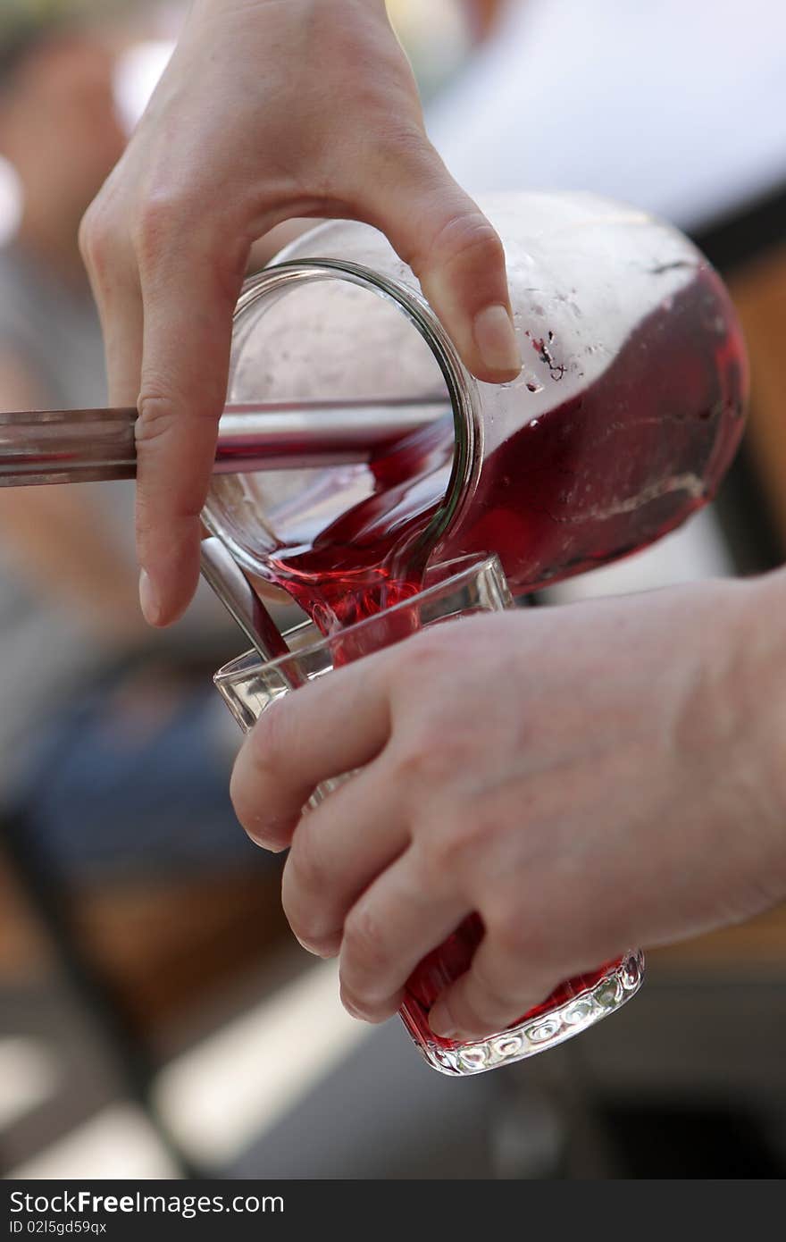 The pouring the juice at restaurant, Odessa, Ukraine