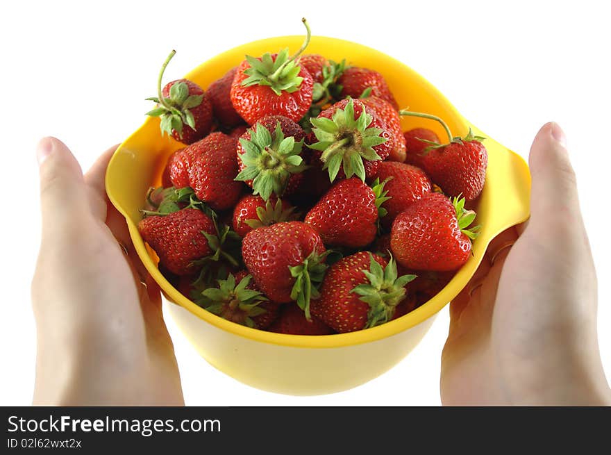 Strawberry in hands