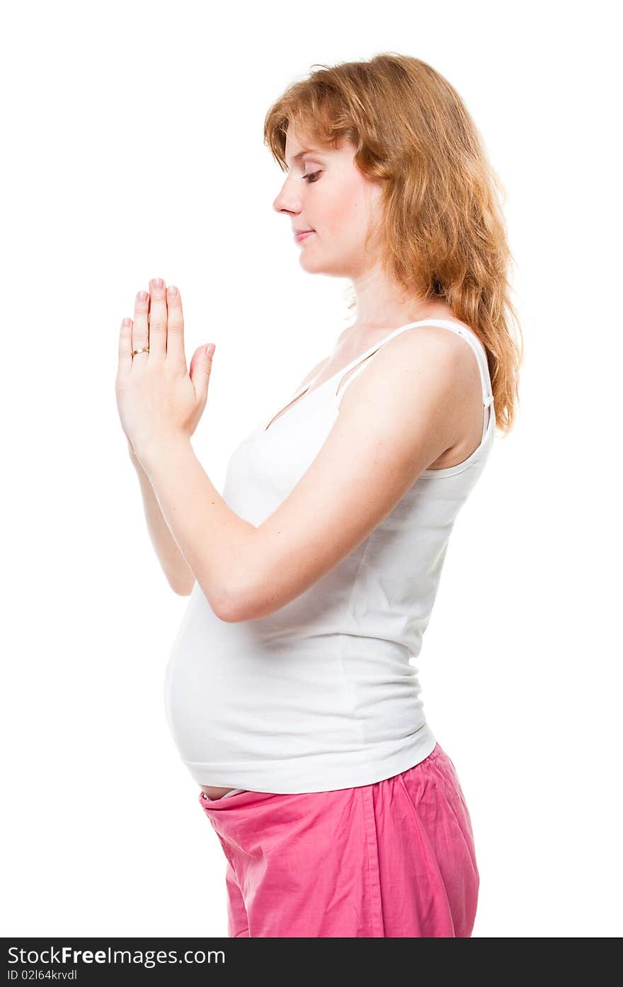 Young pregnant woman making fitness exercises