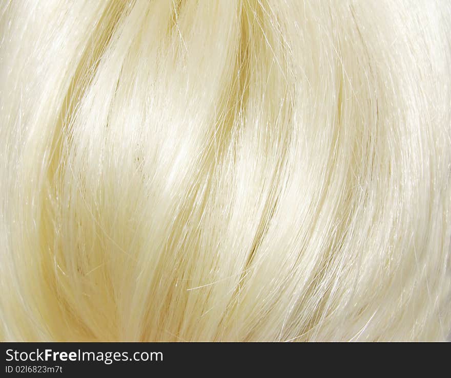 Shiny blond hair texture background