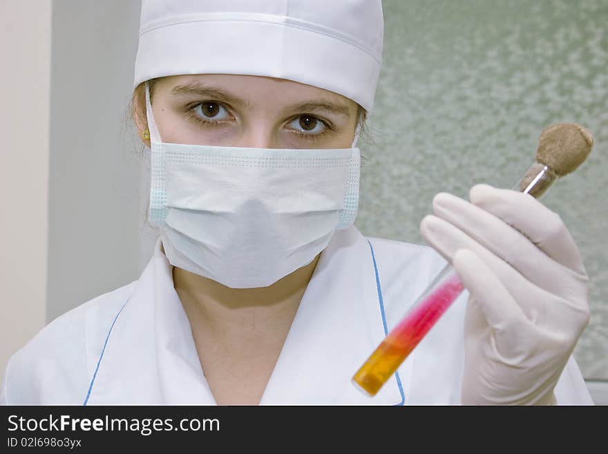 Laboratory worker with a test probe. Laboratory worker with a test probe