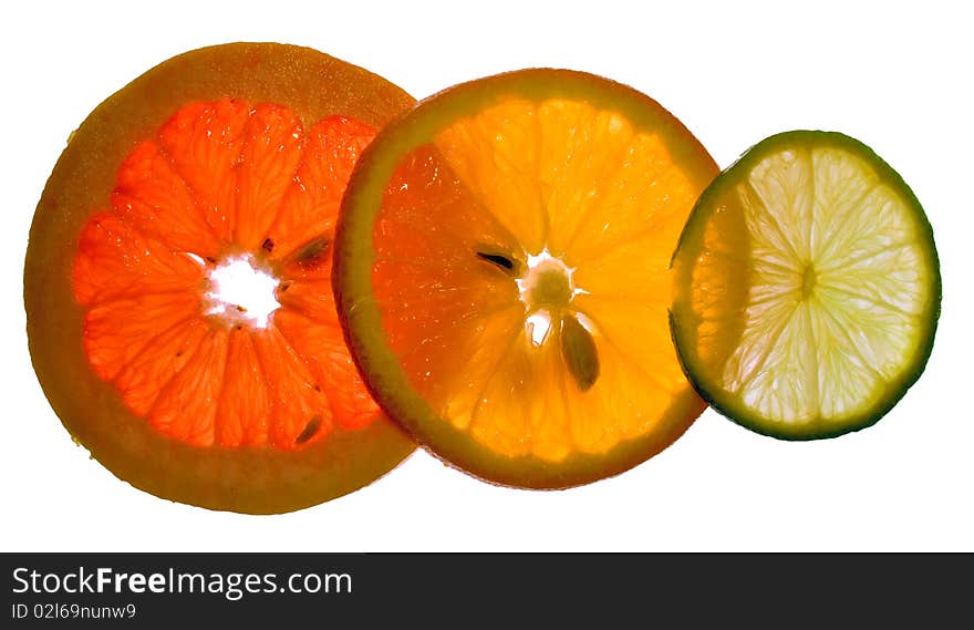 Three juicy colorful citrus fruits