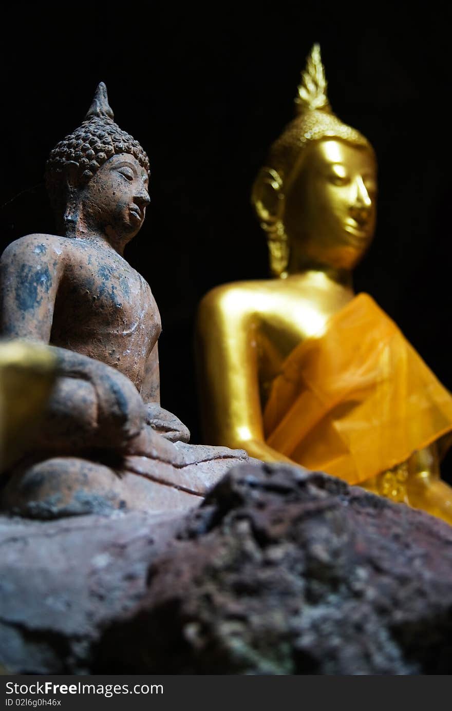 Image of buddha in the cave , Thailand