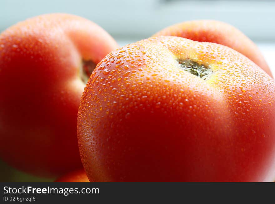 Group of three tomatoes. Red color