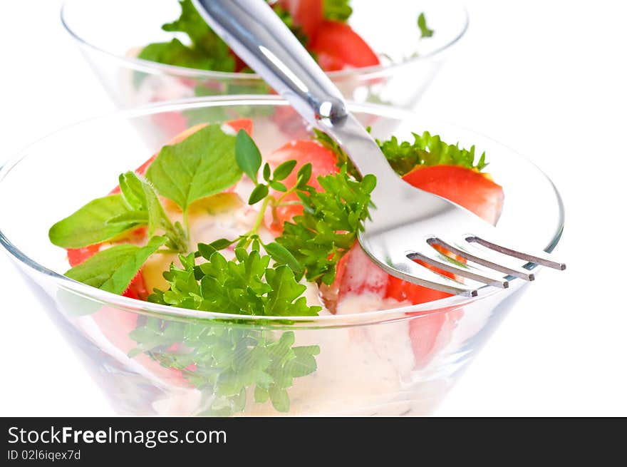 Delicious salad topped with a variety of fresh herbs.