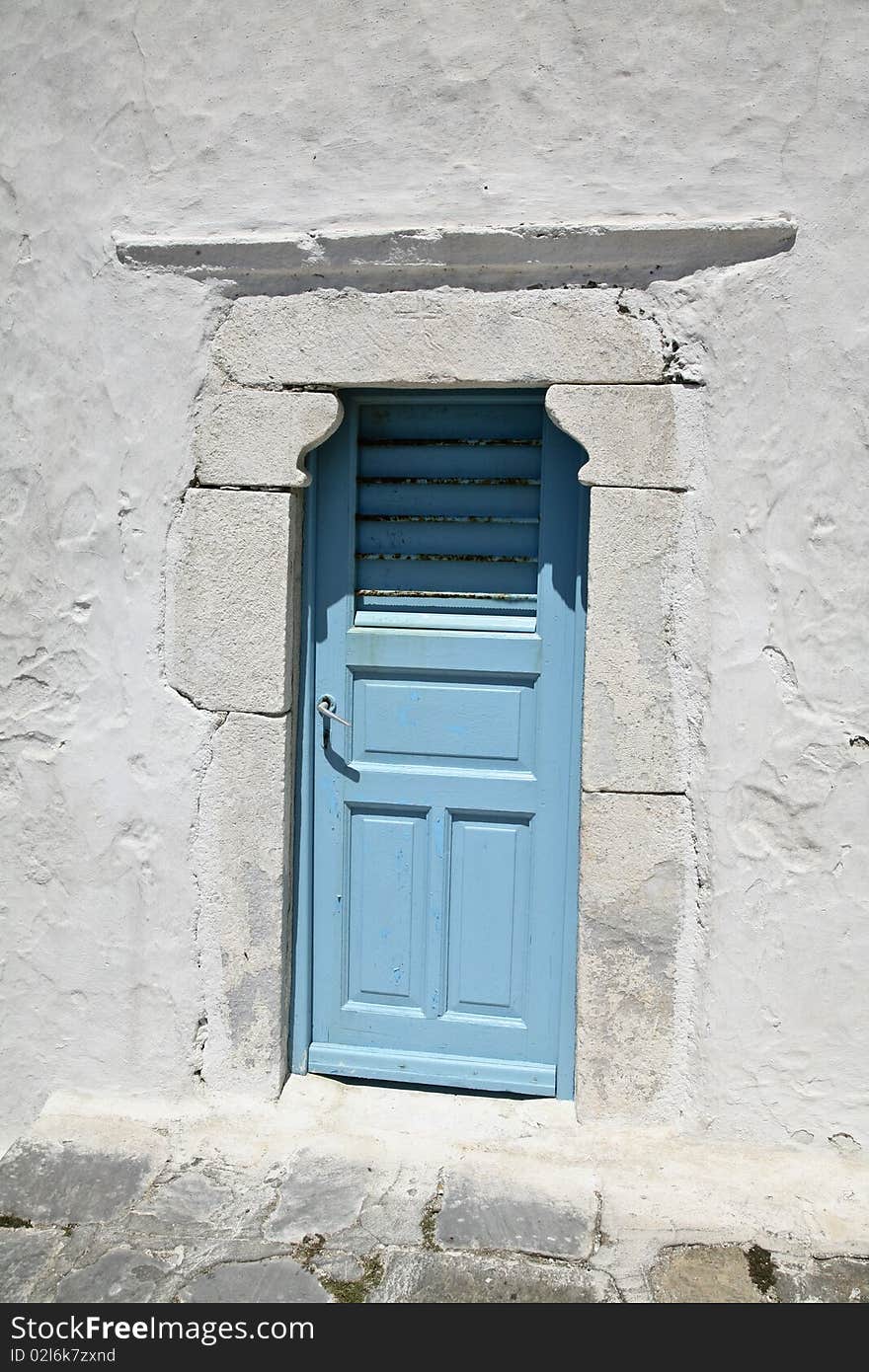 Blue Door In Greece