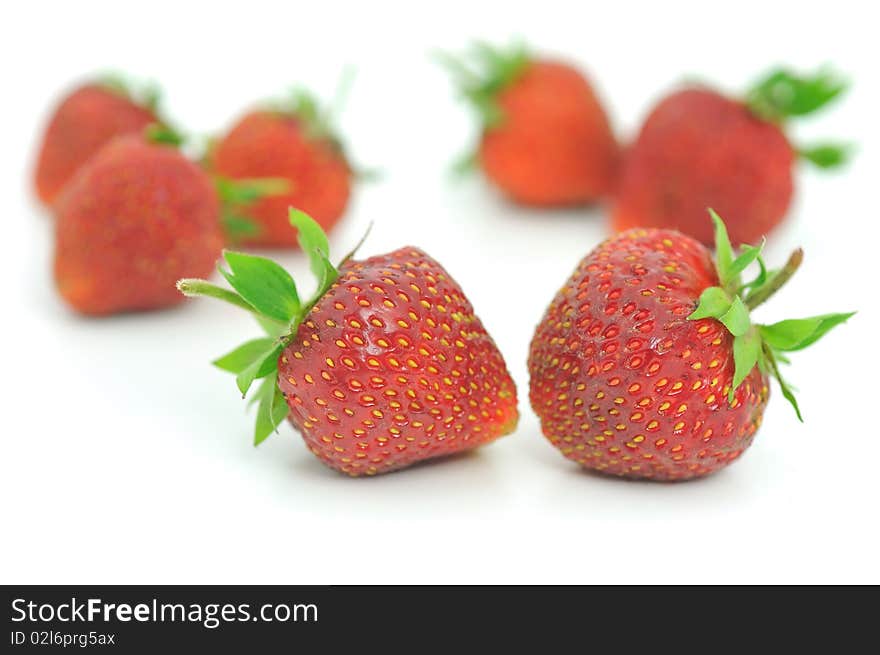 Fresh ripe red strawberries, isolated on white with soft shadow