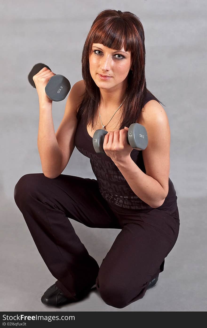 Woman Lifting Weights