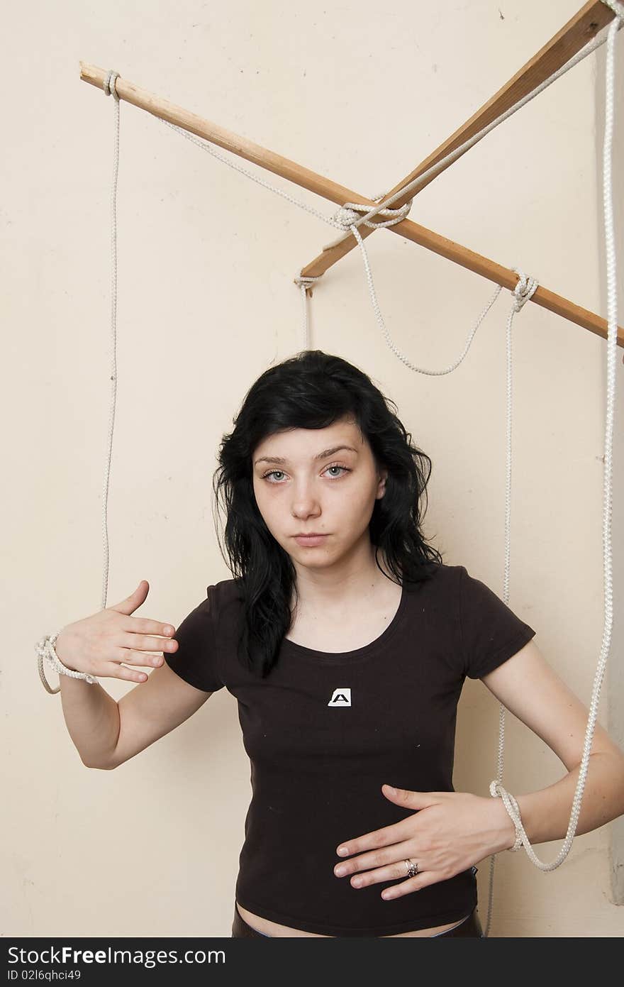 Beautiful Brunette Girl as a Marionette