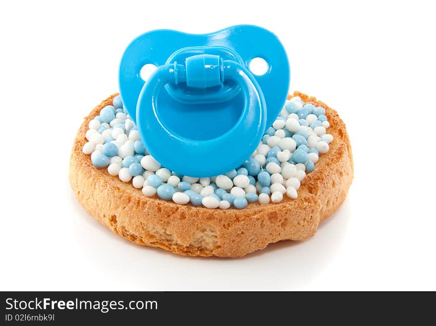 A biscuit with mice with a blue baby's comforter on top isolated over white