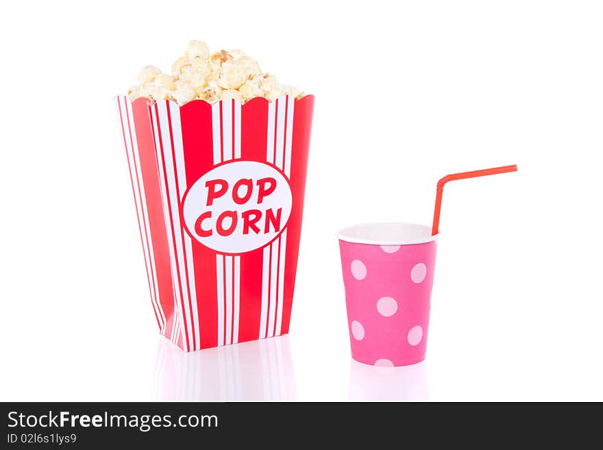 A container with popcorn and a cup with a straw isolated over white