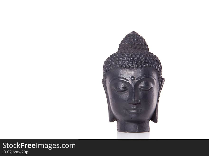 A peacefull Budha statue isolated over white