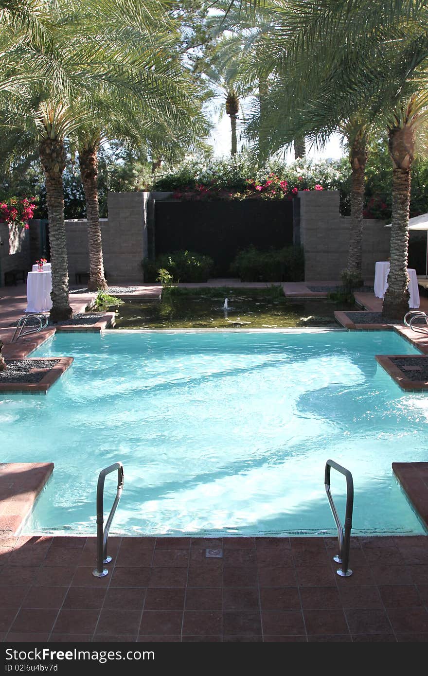 Resort pool with lounge chairs in Arizona. Resort pool with lounge chairs in Arizona