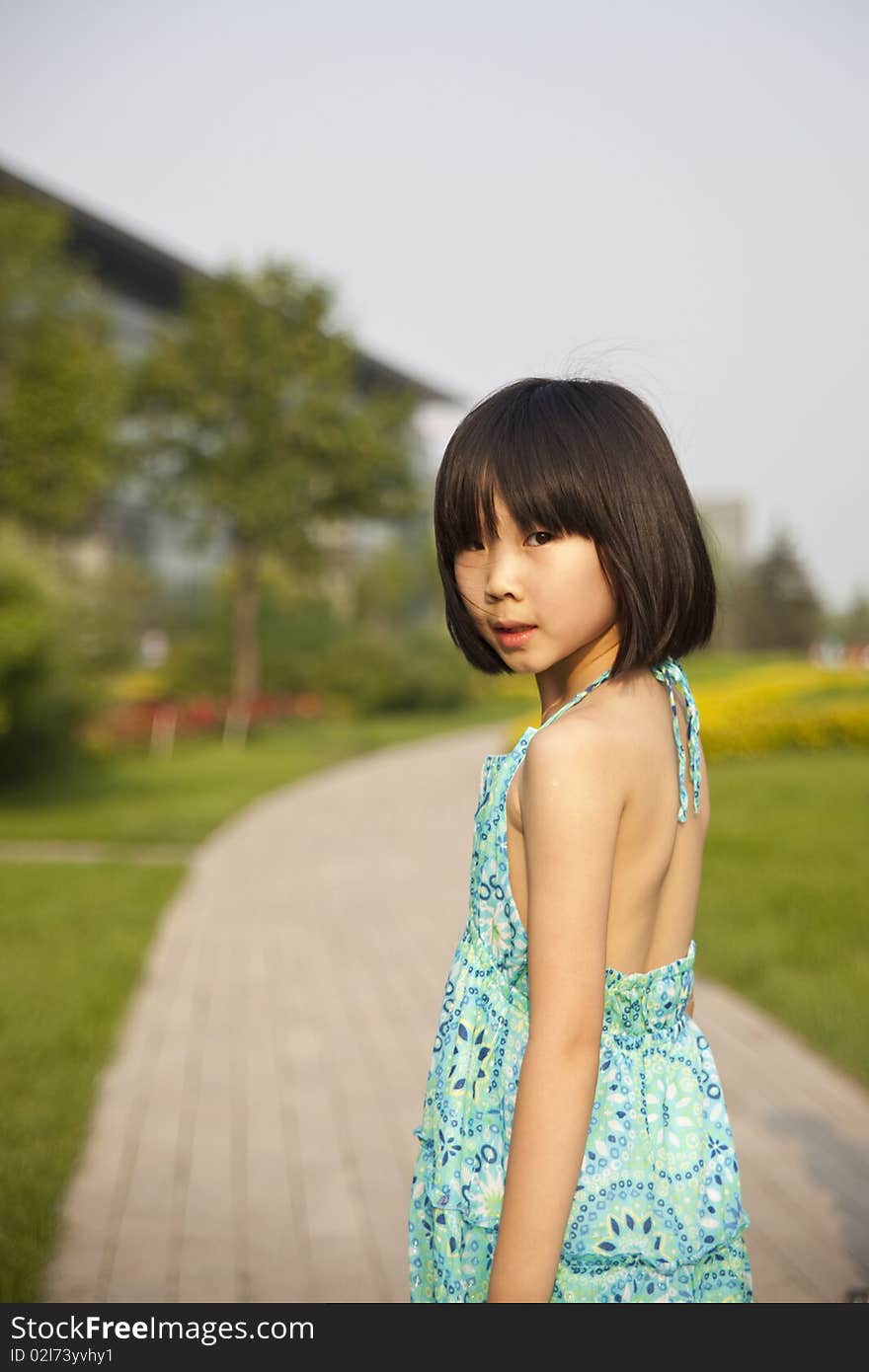 The outdoor portrait of a Chinese girl. The outdoor portrait of a Chinese girl