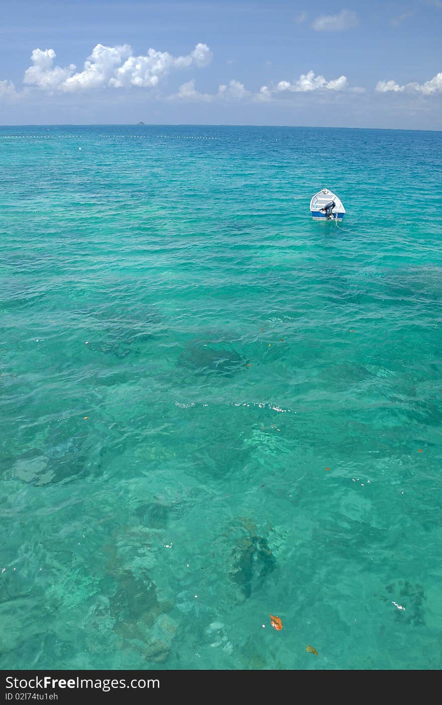 Single boat on a blue sea. Single boat on a blue sea