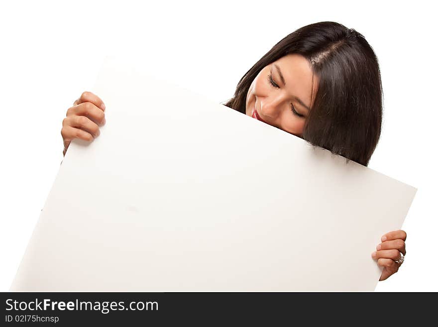 Attractive Multiethnic Woman Holding Blank White Sign Isolated on a White Background.