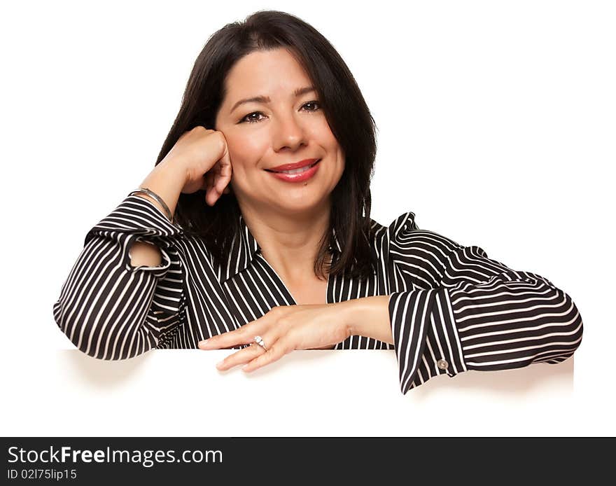 Attractive Multiethnic Woman Leaning on Blank White Sign Corner Isolated on a White Background.