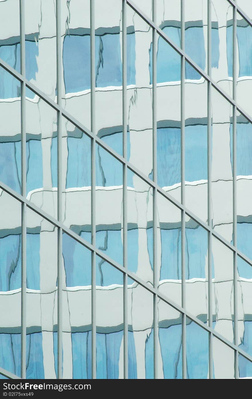 An abstract Reflection on a modern glass building. An abstract Reflection on a modern glass building.