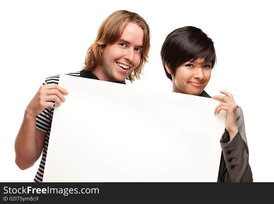 Attractive Diverse Couple Holding Blank White Sign Isolated on a White Background.