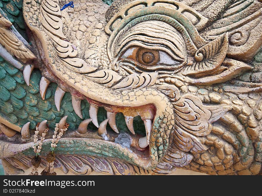 Dragon face carved