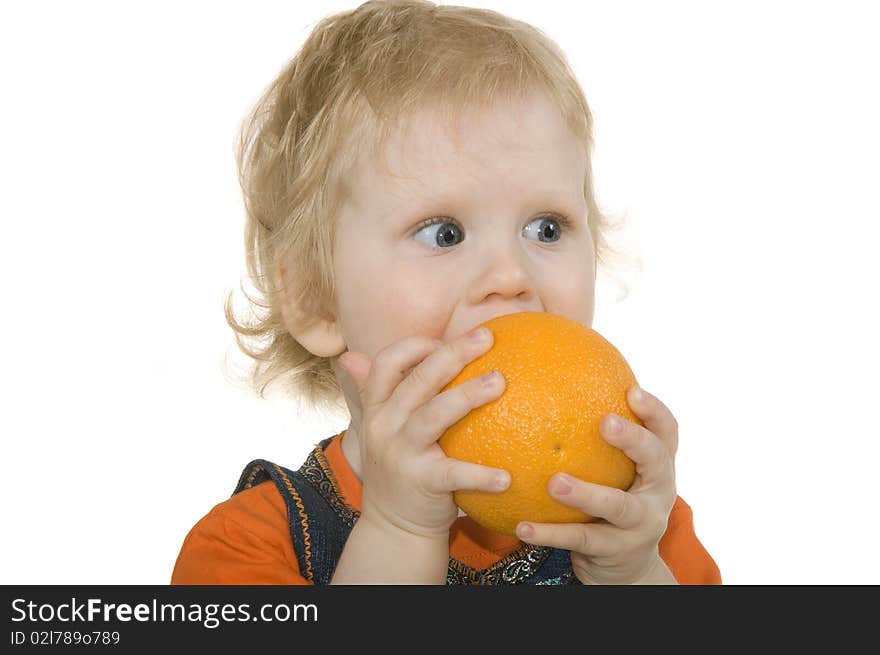 Girl with orange is insulated on white background. Girl with orange is insulated on white background