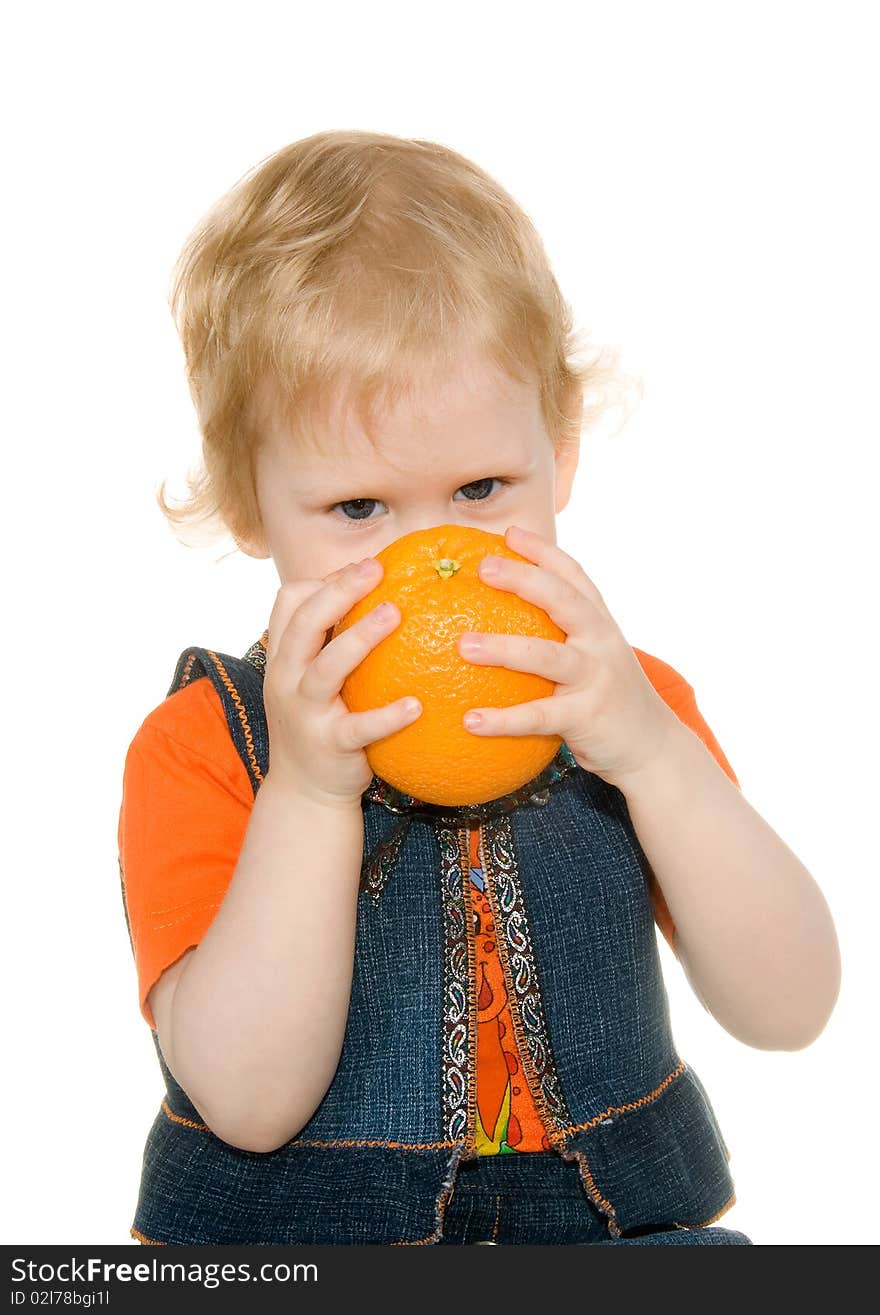 Girl with orange is insulated on white background. Girl with orange is insulated on white background