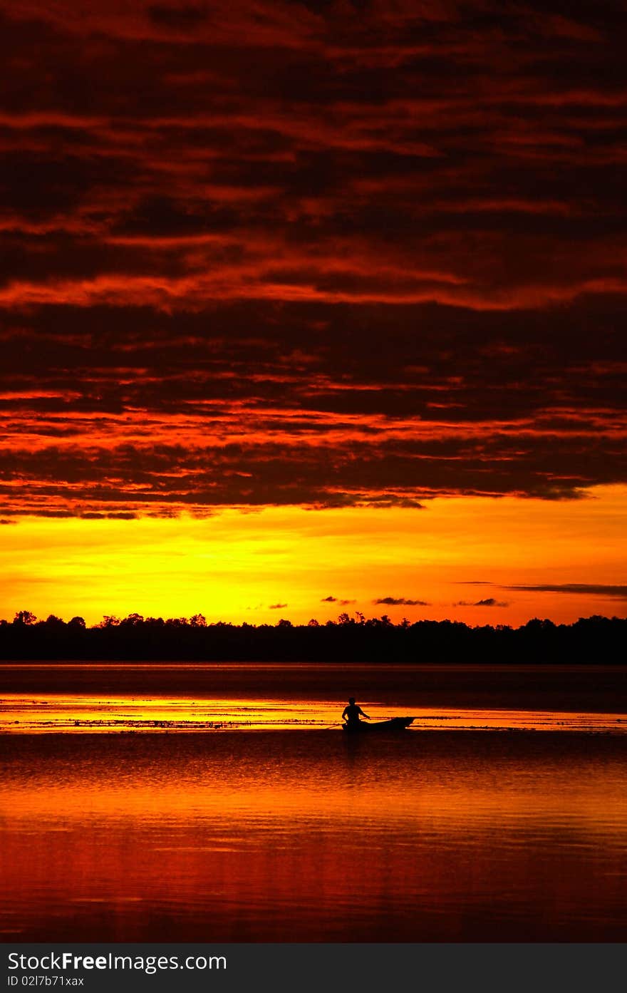 Slow boat on the lake in the evening. Slow boat on the lake in the evening