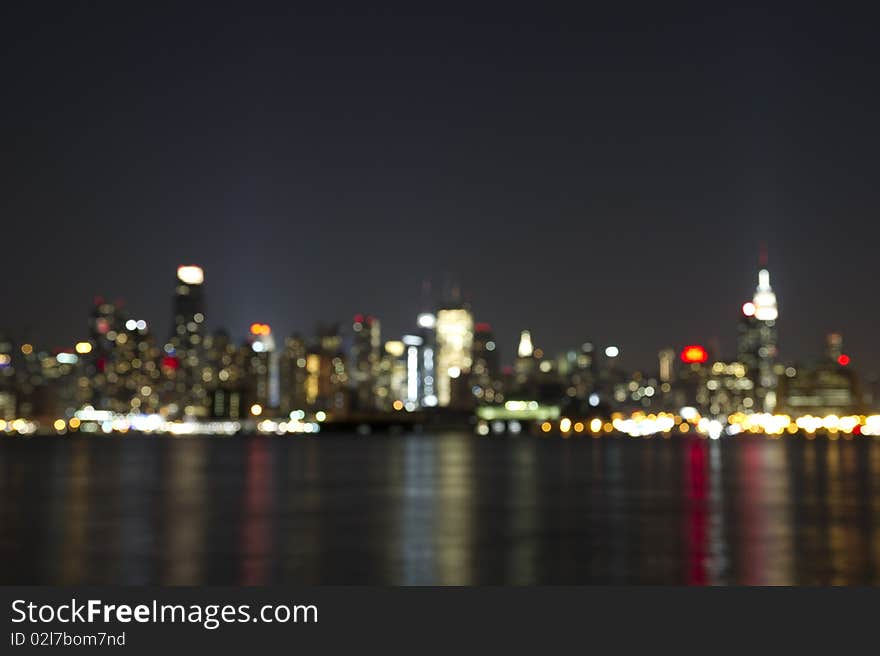 An artistic blur of the Empire State Building and mid town Manhattan in New York City. An artistic blur of the Empire State Building and mid town Manhattan in New York City