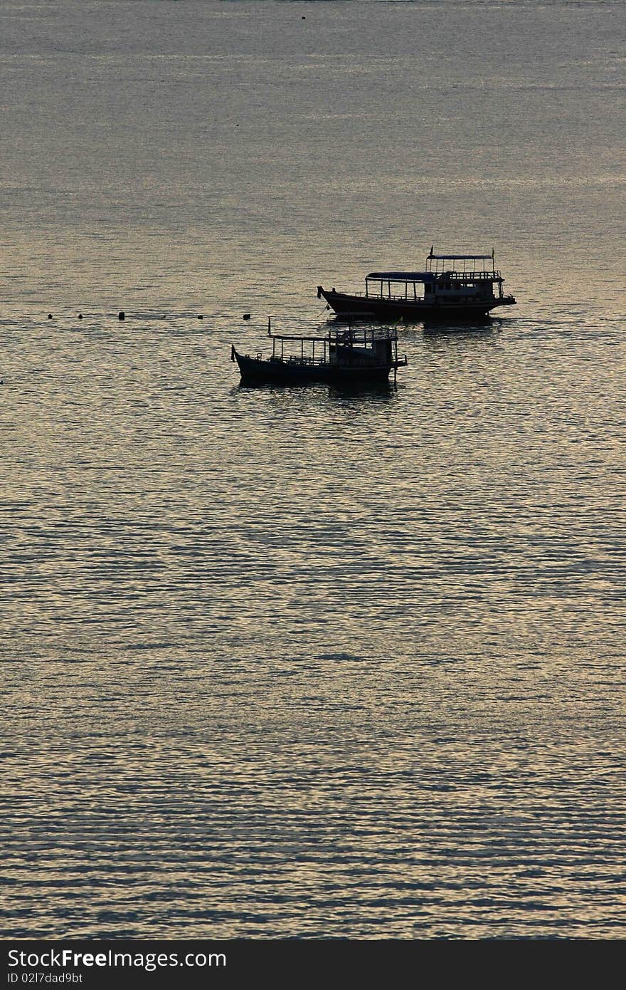 Dark boat on the water