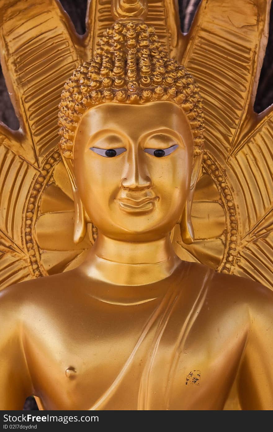 Gold buddha with nagas