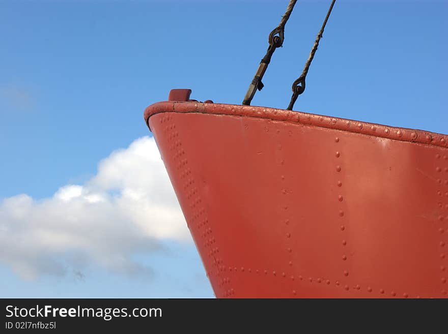 Red Boat And Blue Sky