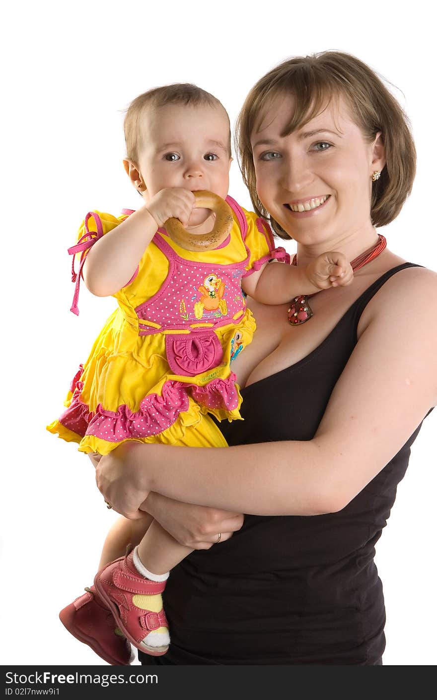 Young woman holding her baby girl. Young woman holding her baby girl