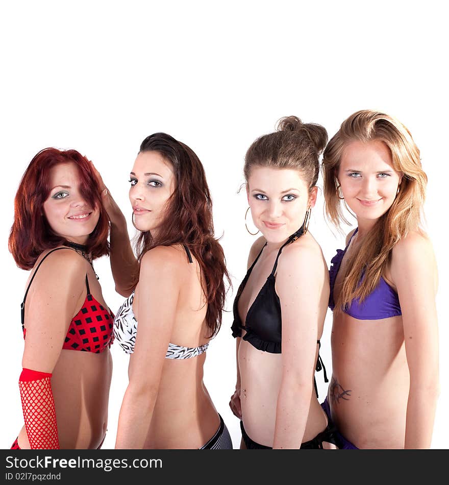 Young group of four models with bikini. They are all partying and having fun. Young group of four models with bikini. They are all partying and having fun.