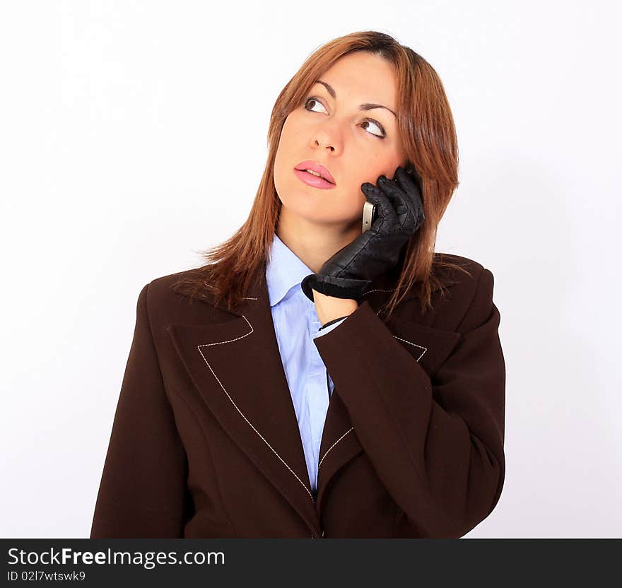Confident woman talking on the cell phone commercial expression