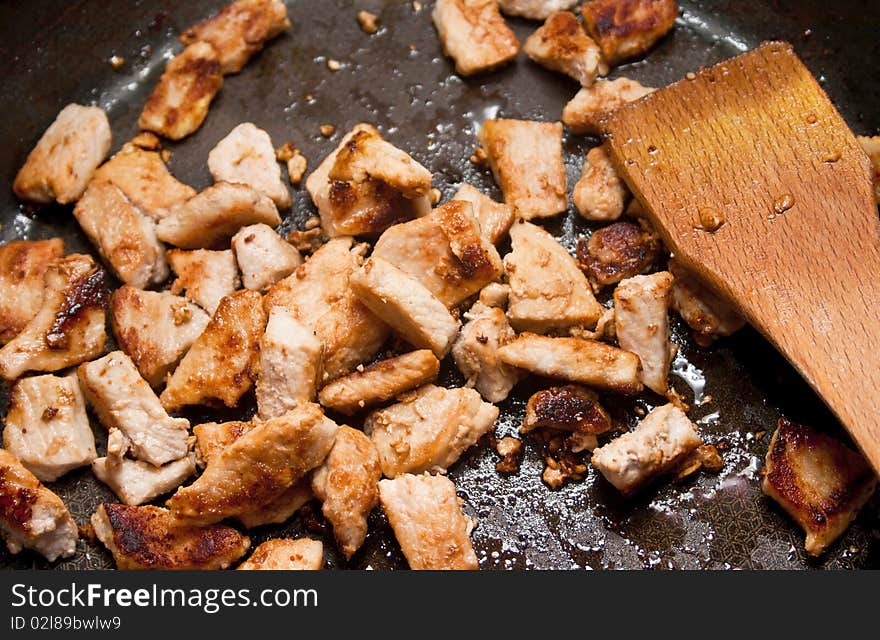 Fried meat processed for a goulash recipe. Fried meat processed for a goulash recipe