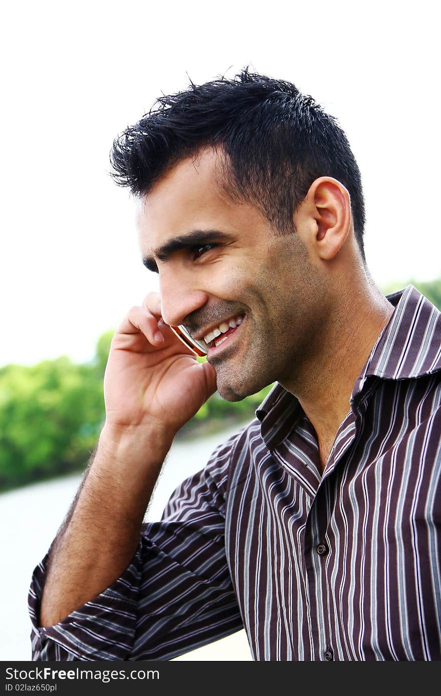 Young and attractive businessman with smile. Young and attractive businessman with smile