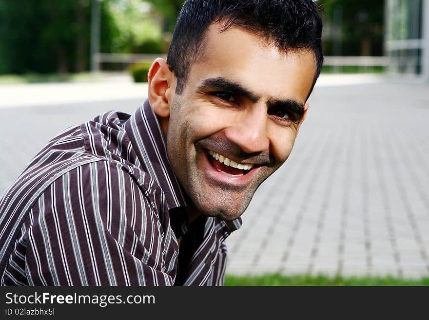 Young and attractive businessman with smile. Young and attractive businessman with smile