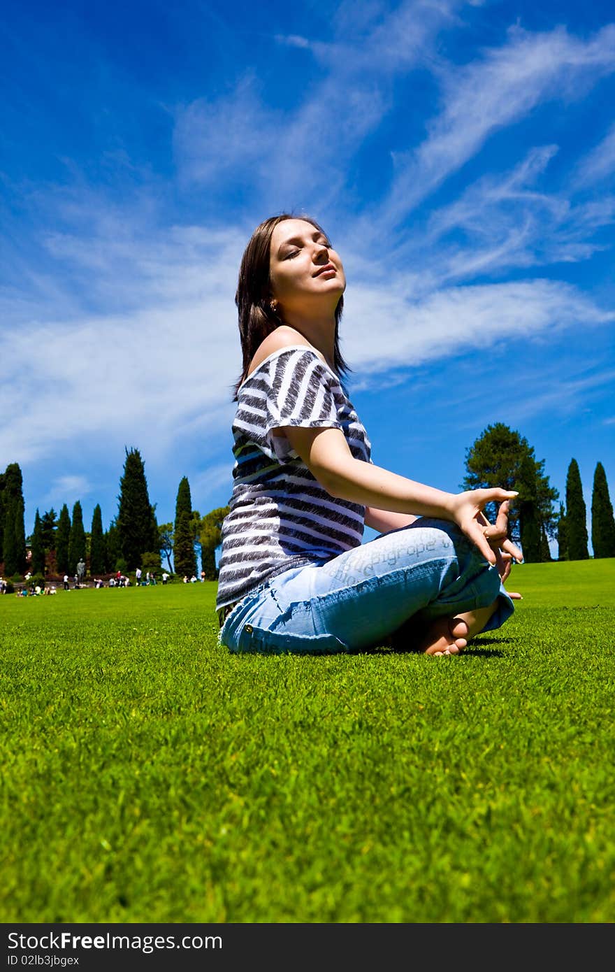 Beautiful Girl on green field